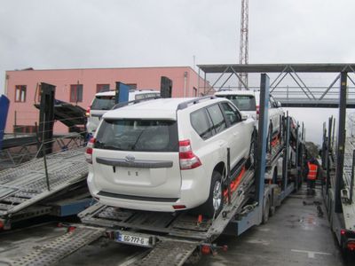 Loading automobiles onto a trailer